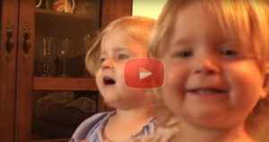 Cute Twin Girls Reciting the Lord's Prayer